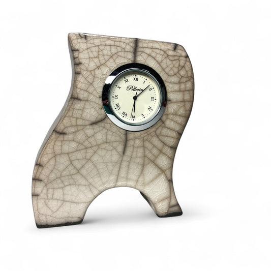 Plume - Horloge en céramique par Karine Pellerin